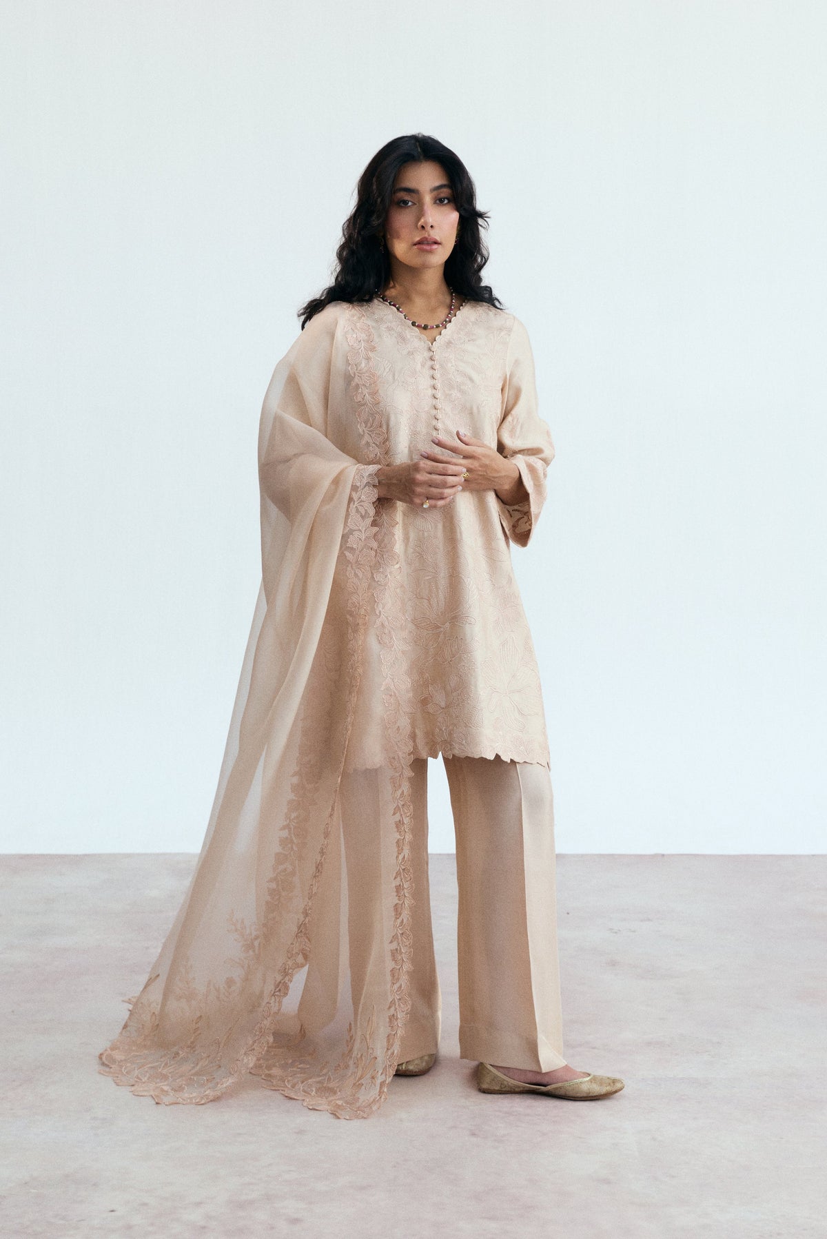 Peachy pink pastel Pakistani embroidered suit