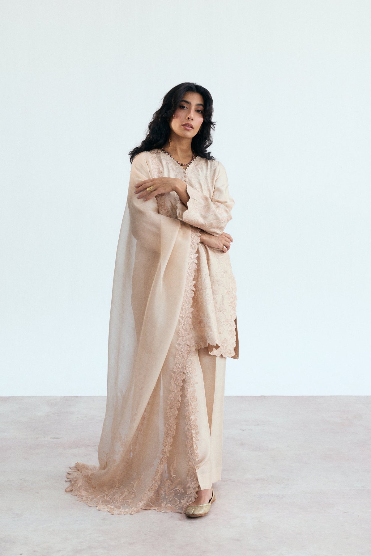 Full-length view of the Peony Set, a soft pastel embroidered Pakistani outfit styled for parties and casual occasions