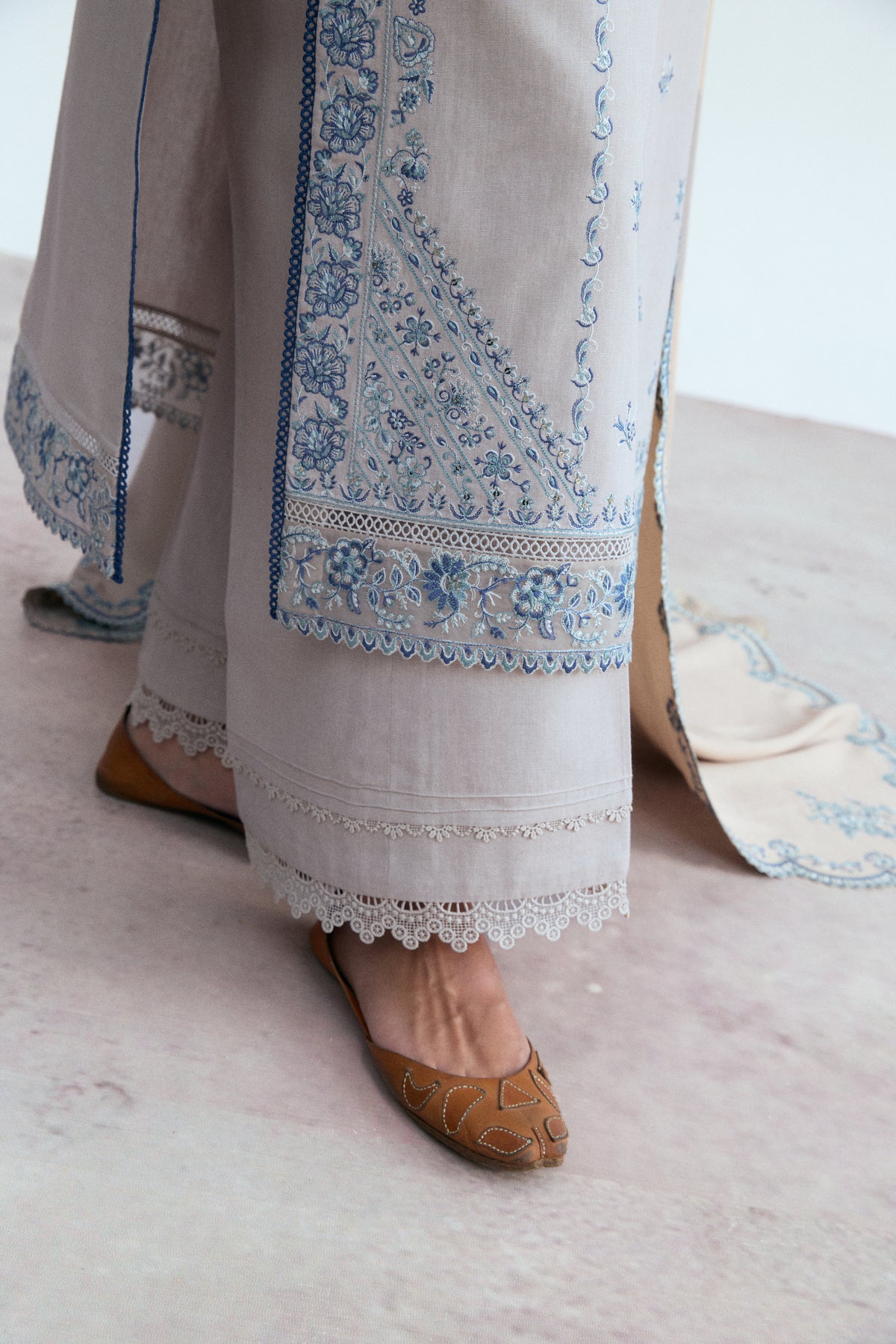 Gardenia khaddar suit set — creamy oat Pakistani formal kameez with organza pleated trousers and embroidered winter shawl by Mannam
