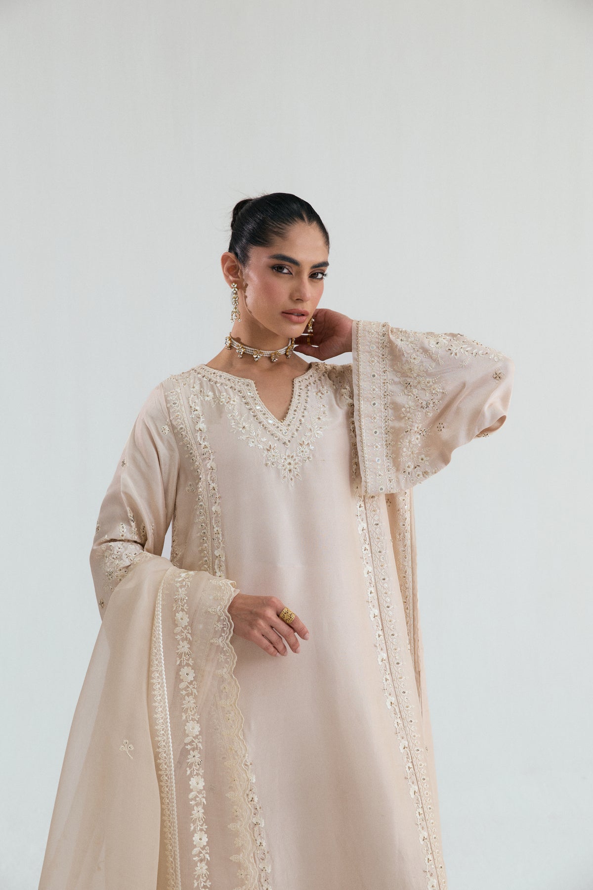 Luxury Pakistani silk 3-piece suit in honey gold colour, styled for a UK wedding occasion
