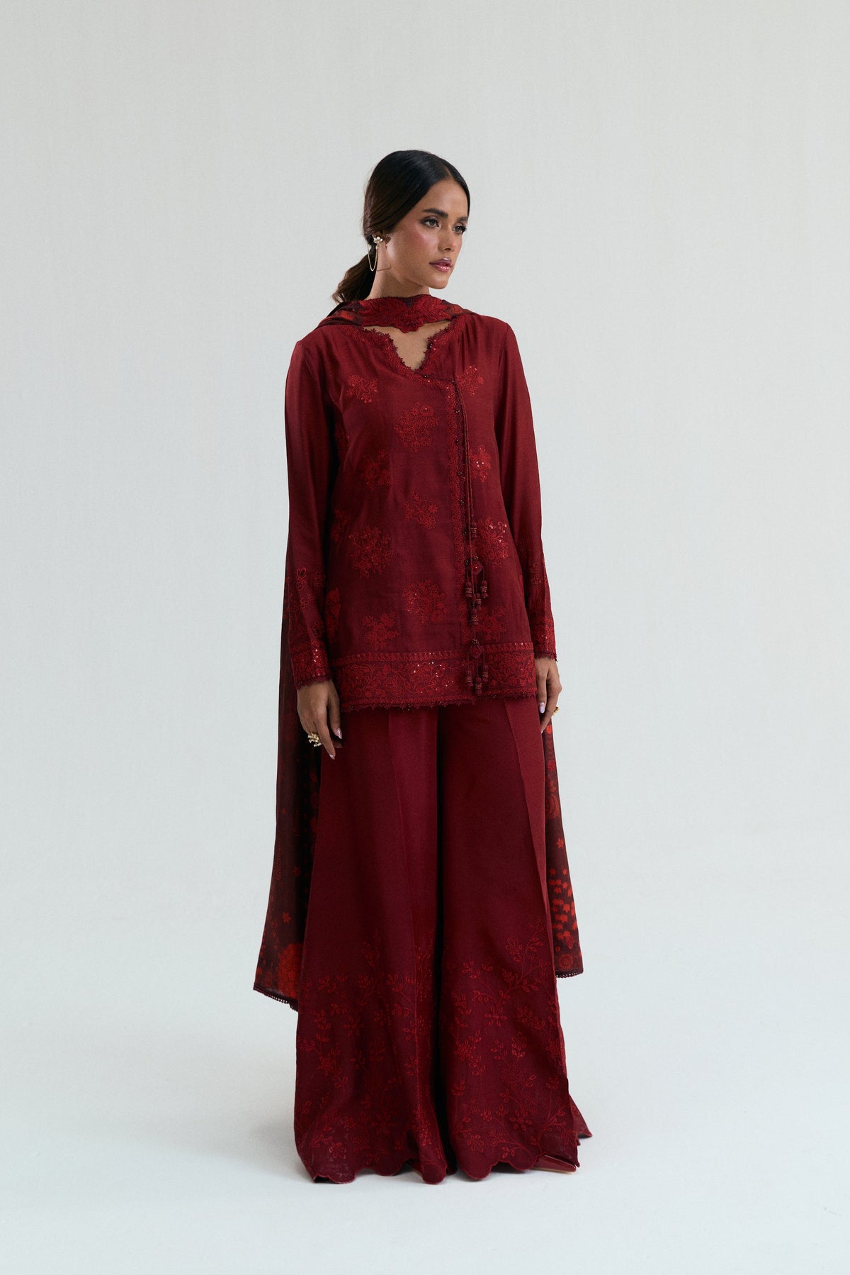 Mannam Cherry Set — deep red raw silk short angrakha with Aari embroidery, crystal pearl details and tassels, Pakistani Eid suit UK