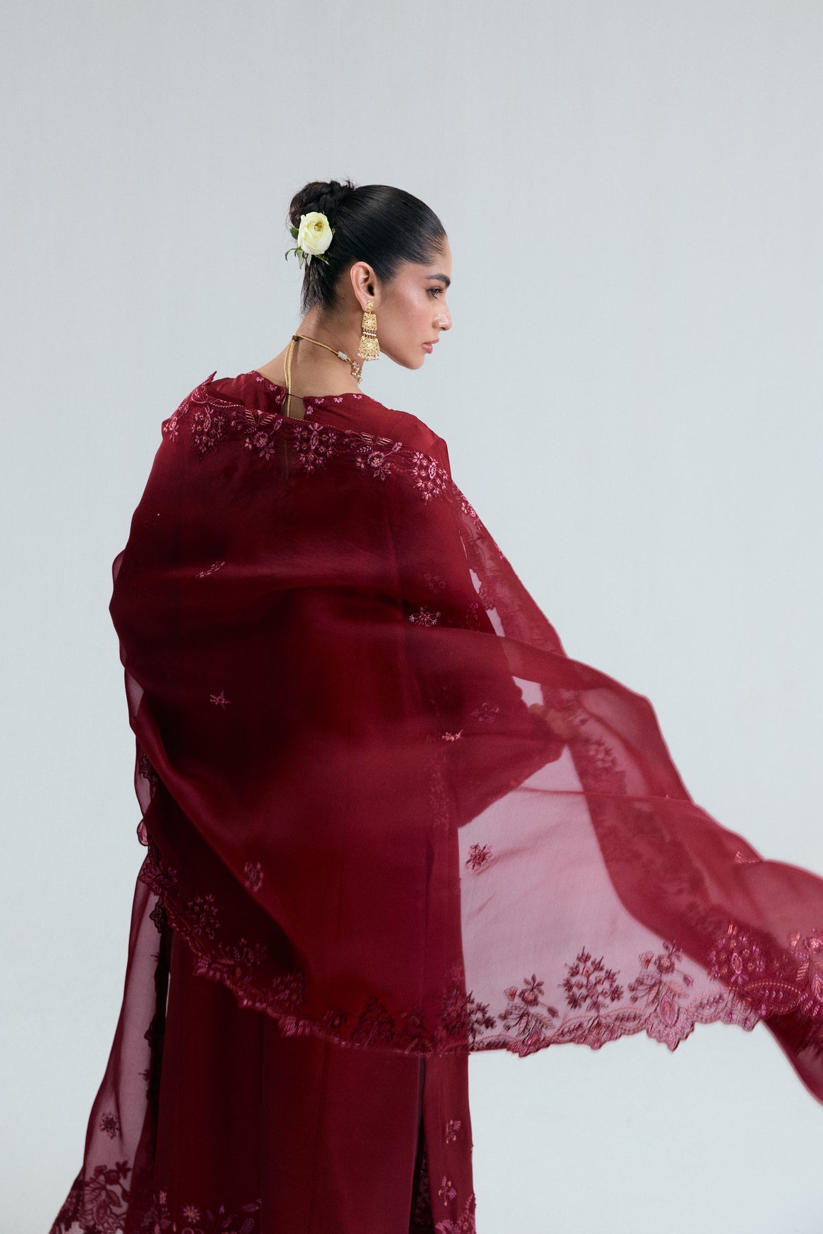 Full-length view of maroon Pakistani raw silk three-piece set — formal occasion wear with organza dupatta UK