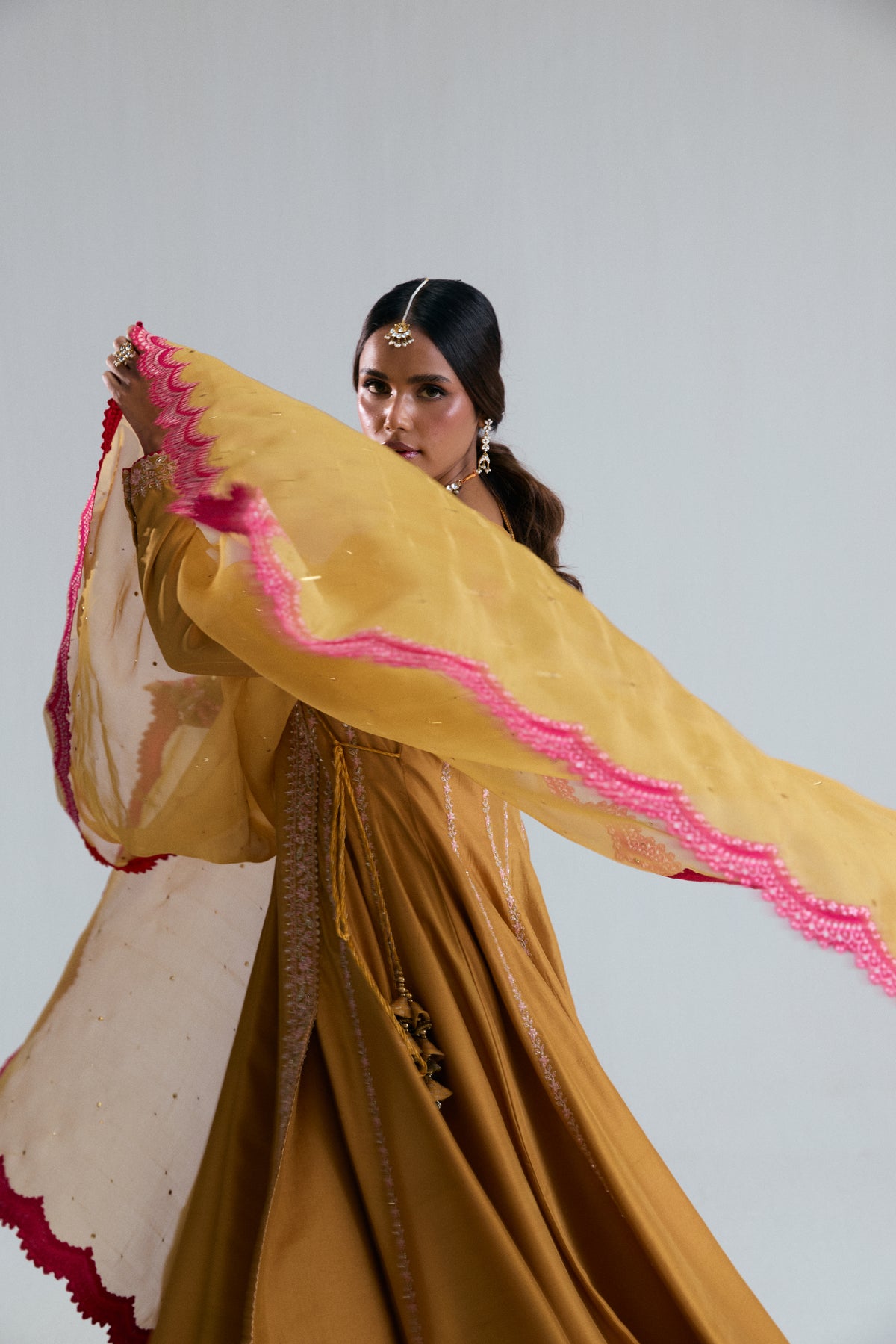 Pakistani formal wear Kalidaar Angrakha mustard yellow frock crafted in luxurious silk and organza