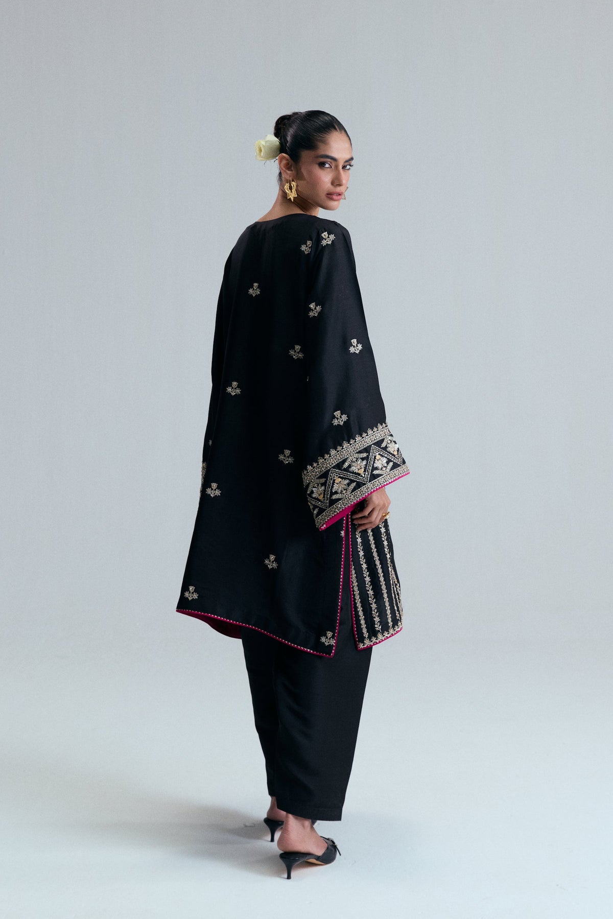 The back of the Starlight Set black silk shirt showing the high-quality fabric and simple design.