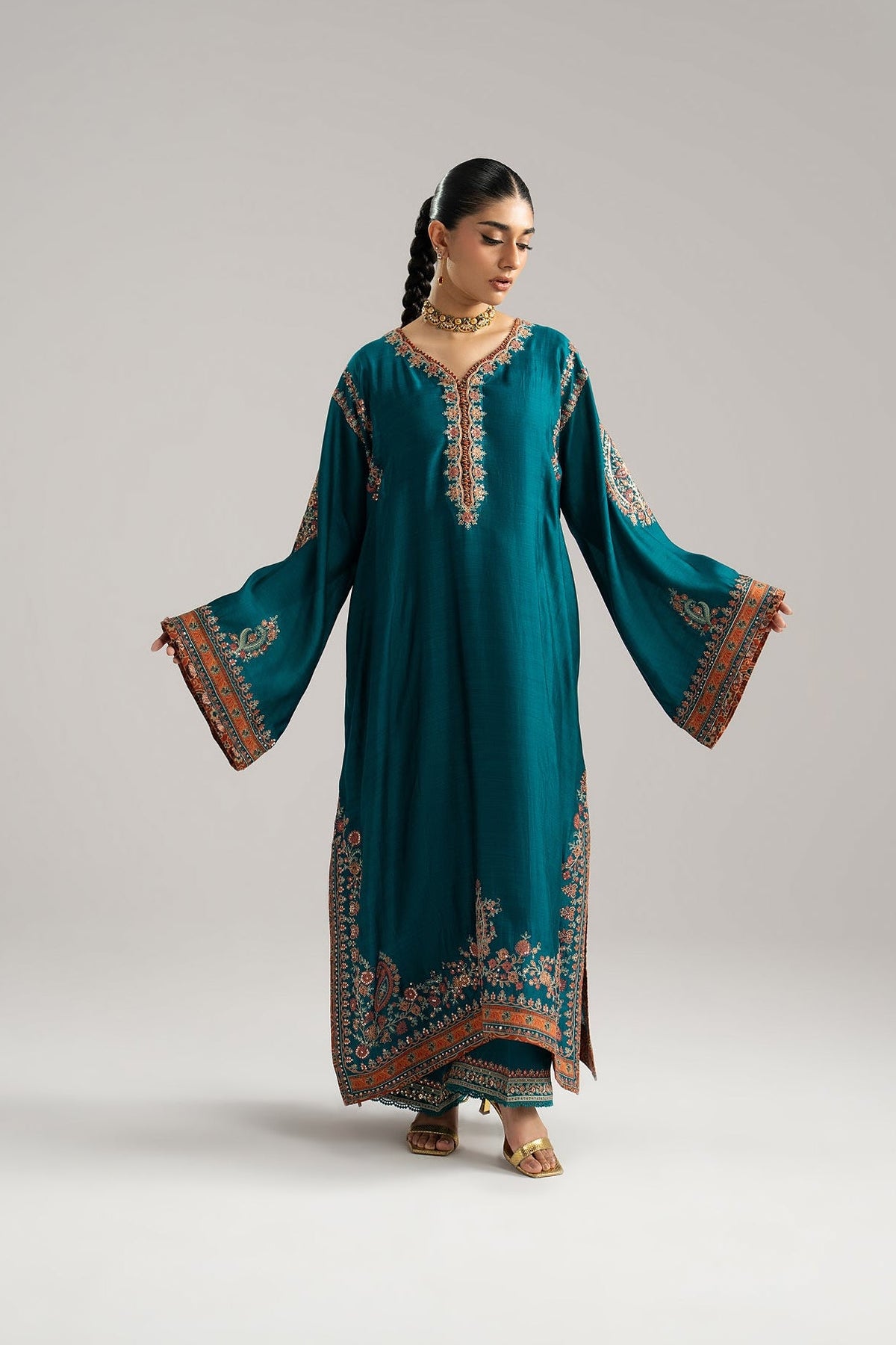 Afroz Set close-up — teal pure silk phiran with knot loop neckline detailing and sequin accents — Mannam designer pret UK