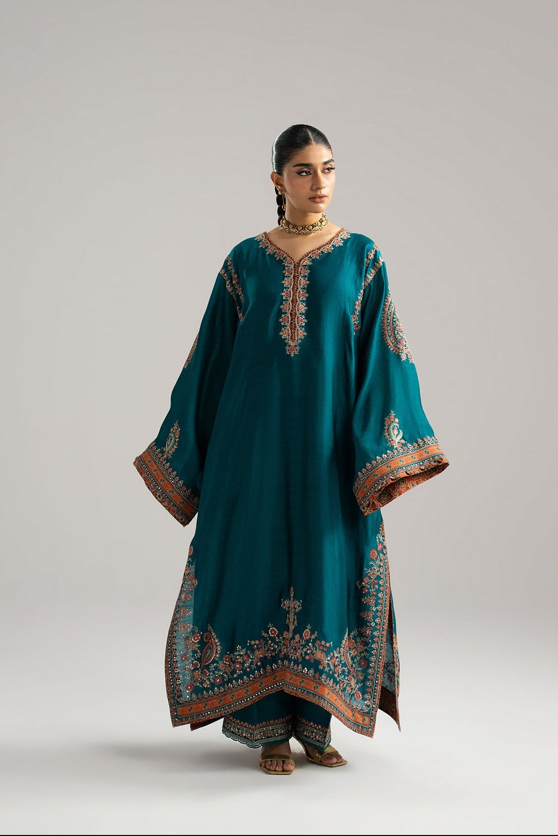 Elegant teal Pakistani phiran with ajrak print accents and knot loop neckline