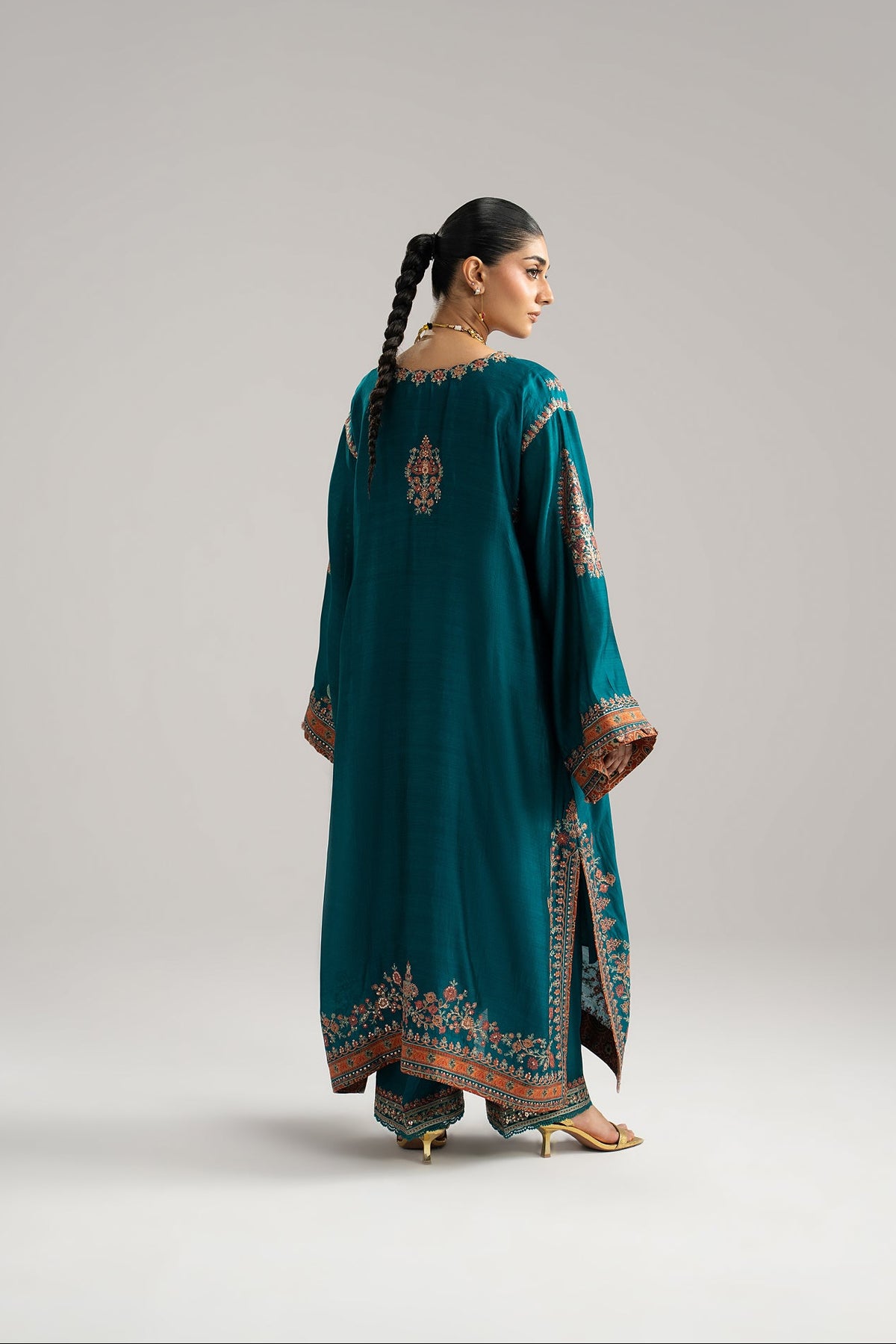 Pakistani teal silk phiran with raw silk trousers featuring embroidery and lace details — Afroz Set by Mannam UK
