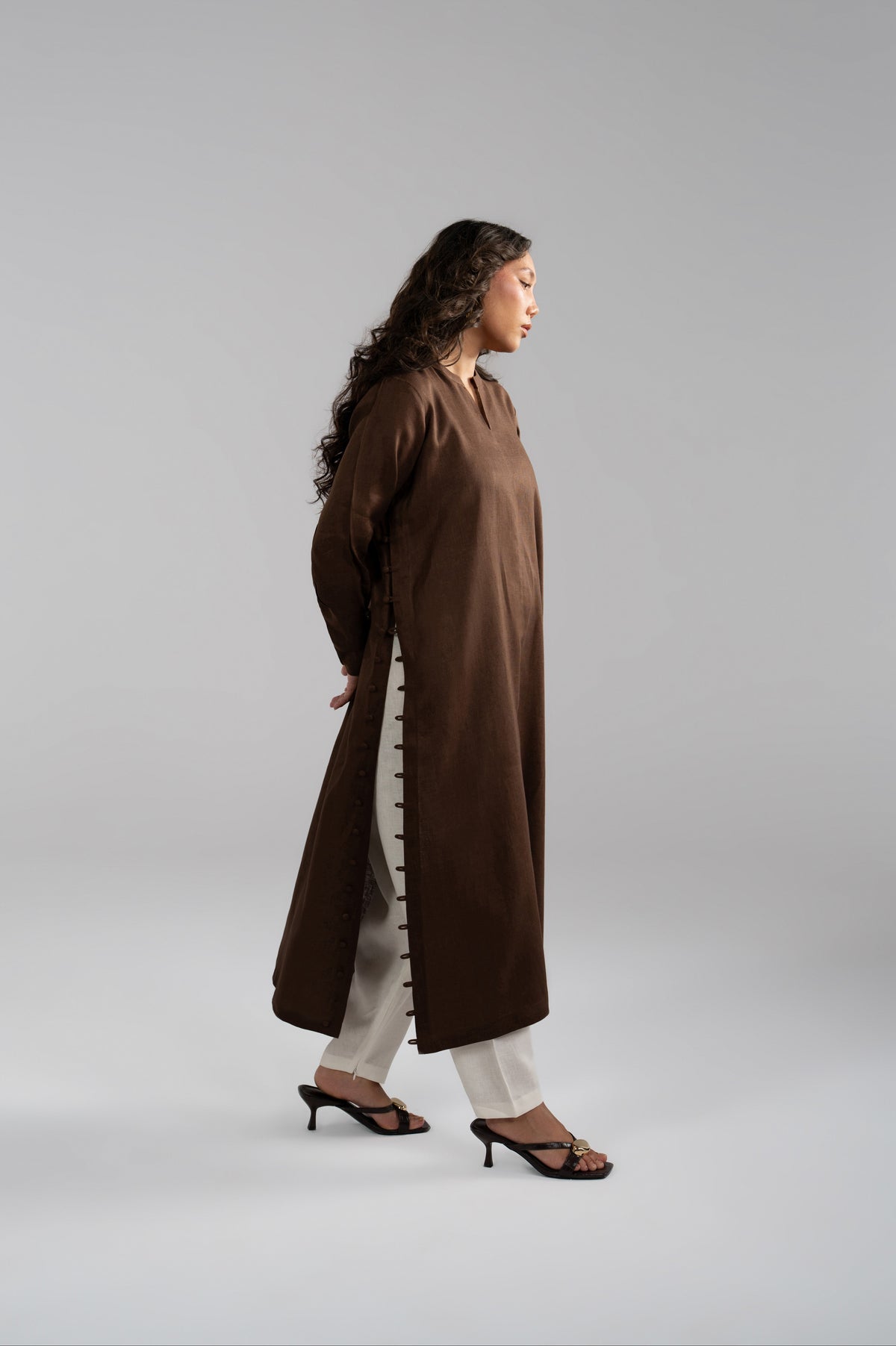 Mocha Set kameez in motion, loop button detail visible while walking
