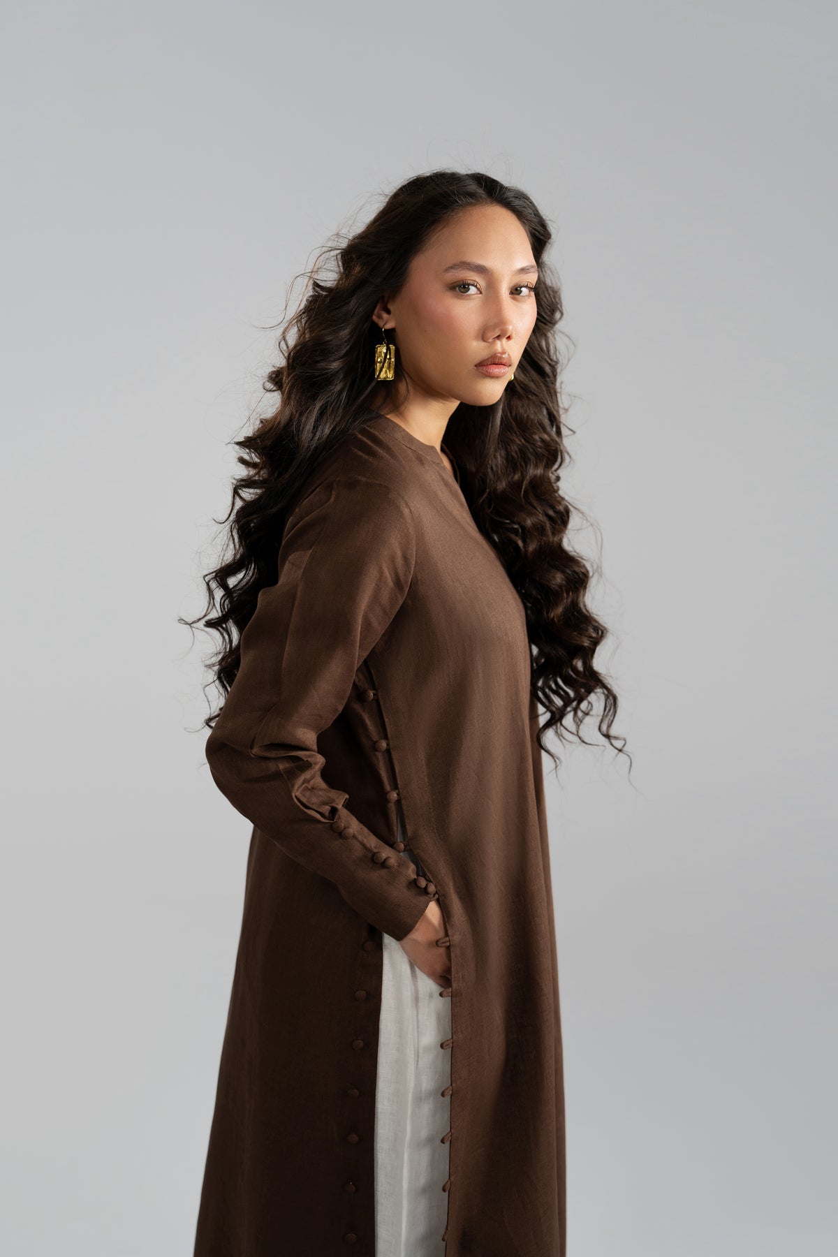 loop button placket along the front slit