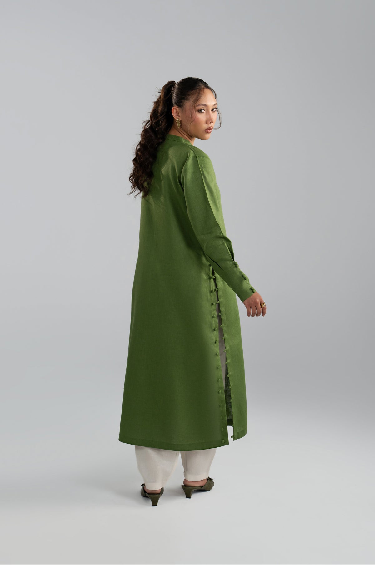 Loop button detailing along the side seam