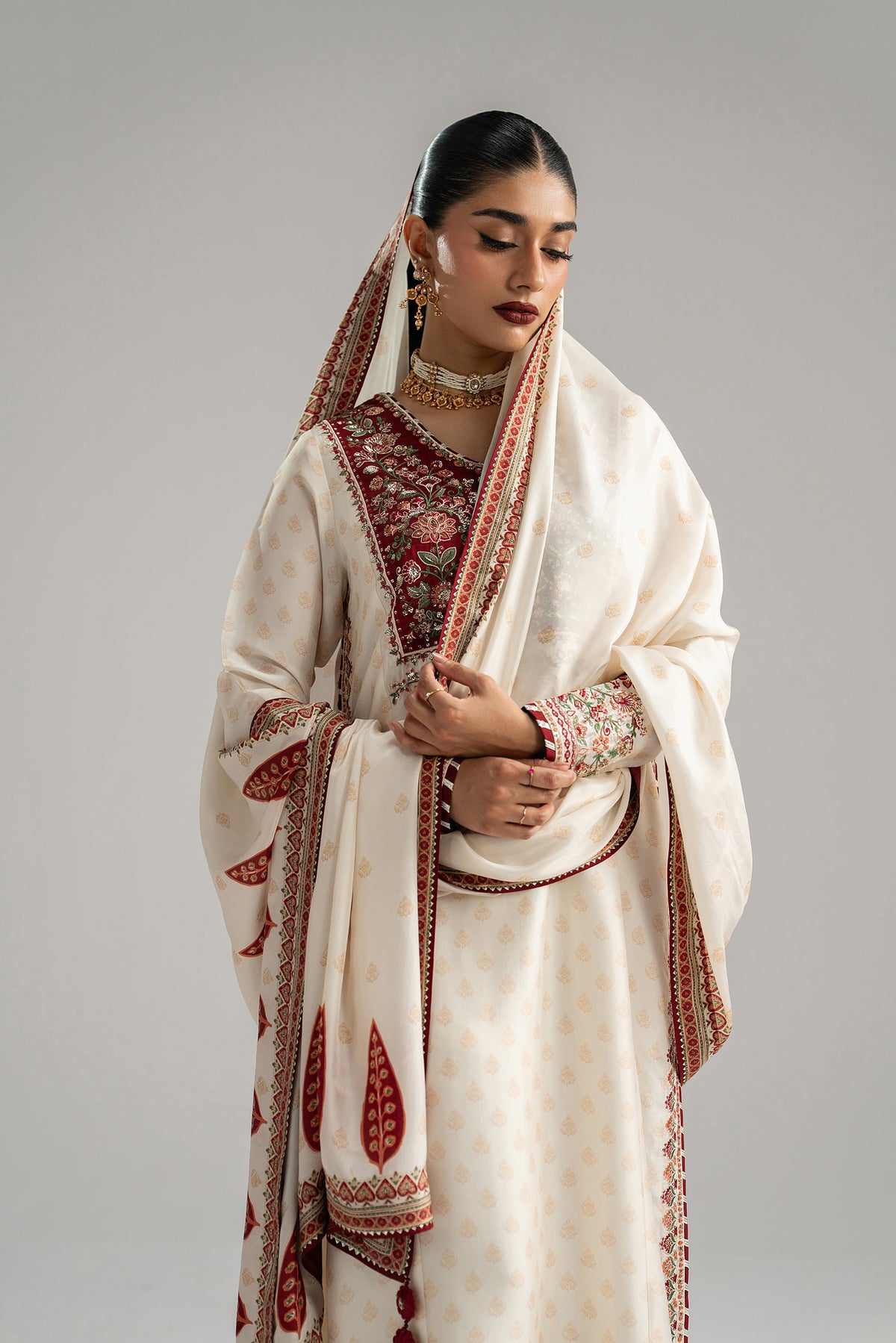 Silk dupatta detail — goti embroidery and tassels on printed dupatta