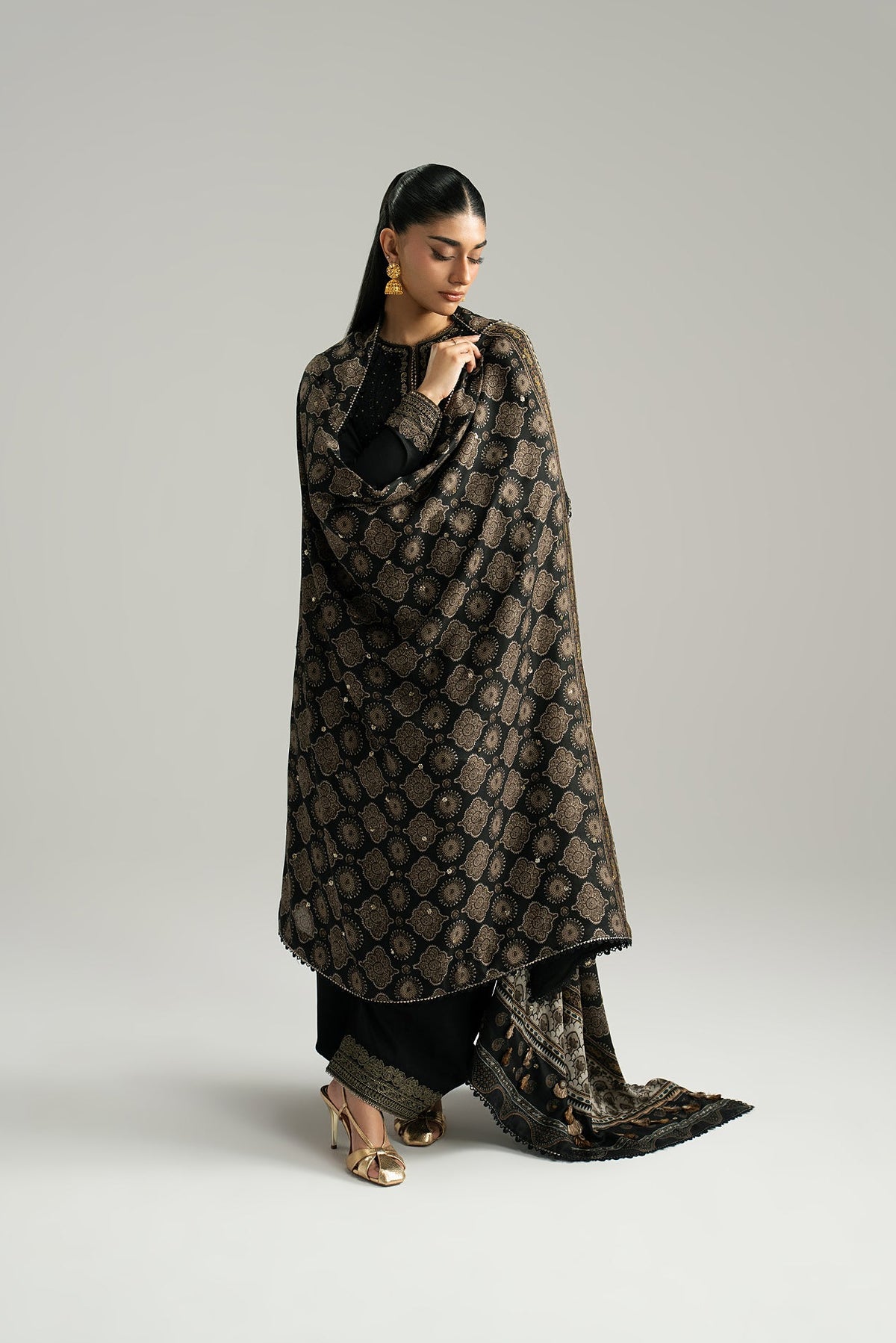 Balloon shalwar detail — tilla embroidery and goti lace at hem | Mannam Eclipse black cotton set