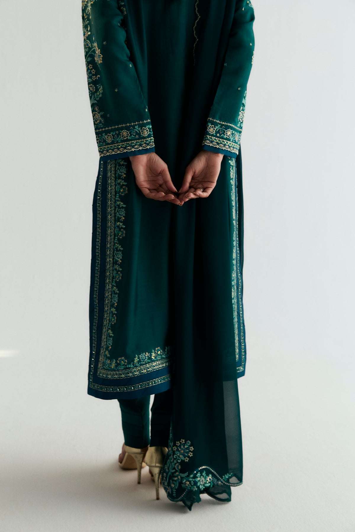 Designer Pakistani three-piece embroidered suit in teal khaadi silk — eid wear