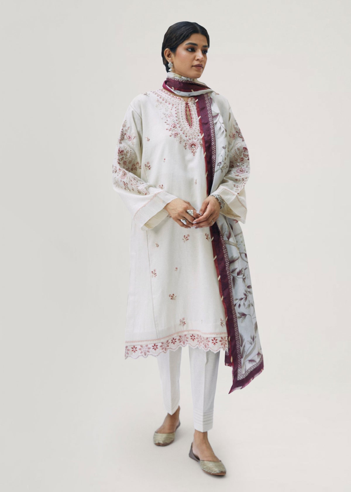 Elegant ecru festive kameez outfit with hand-embellished detailing and pockets — Pakistani formal wear by Mannam