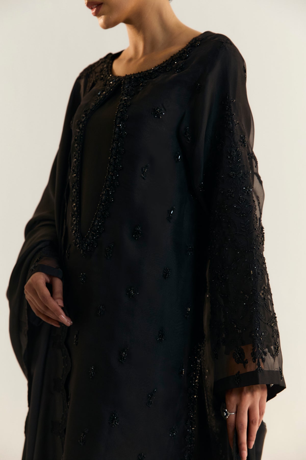 Premium Raven black Pakistani formal three-piece — organza kameez with raw silk culottes and embroidered silk dupatta