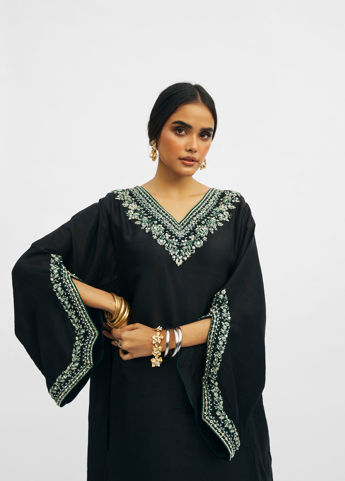 Designer black raw silk Pakistani phiran outfit with hand-embroidered neckline — formal South Asian wear UK
