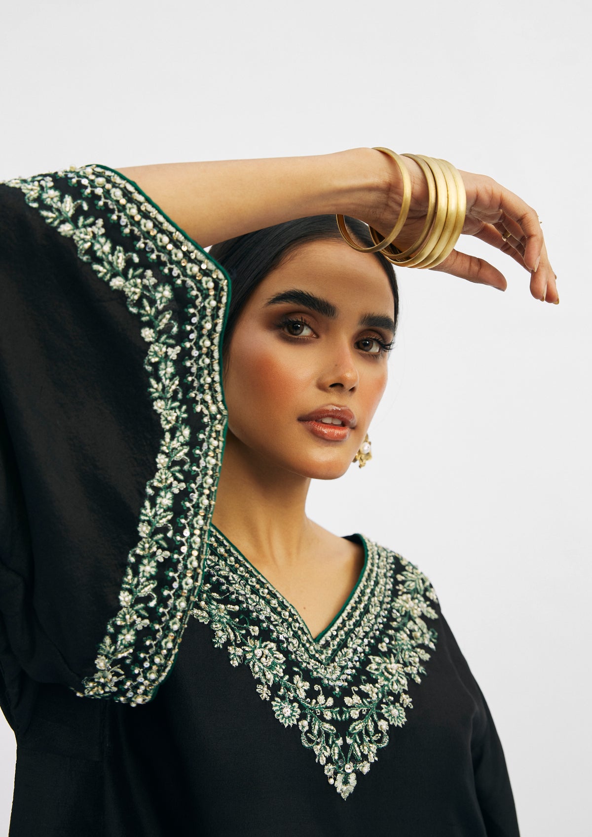 Luxury black raw silk ethnic phiran set for women — handcrafted embellishments on neckline and sleeves by Mannam