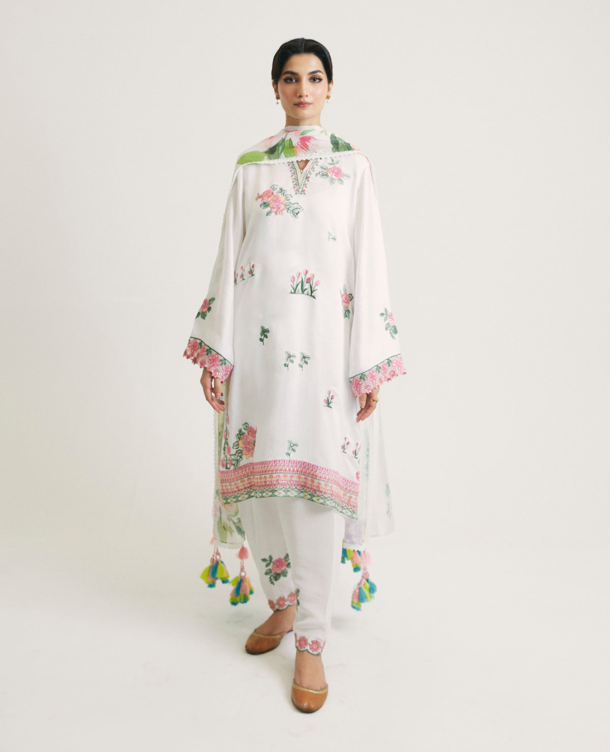white Pakistani kameez with all-over floral embroidery and motif on back — UK brand Mannam