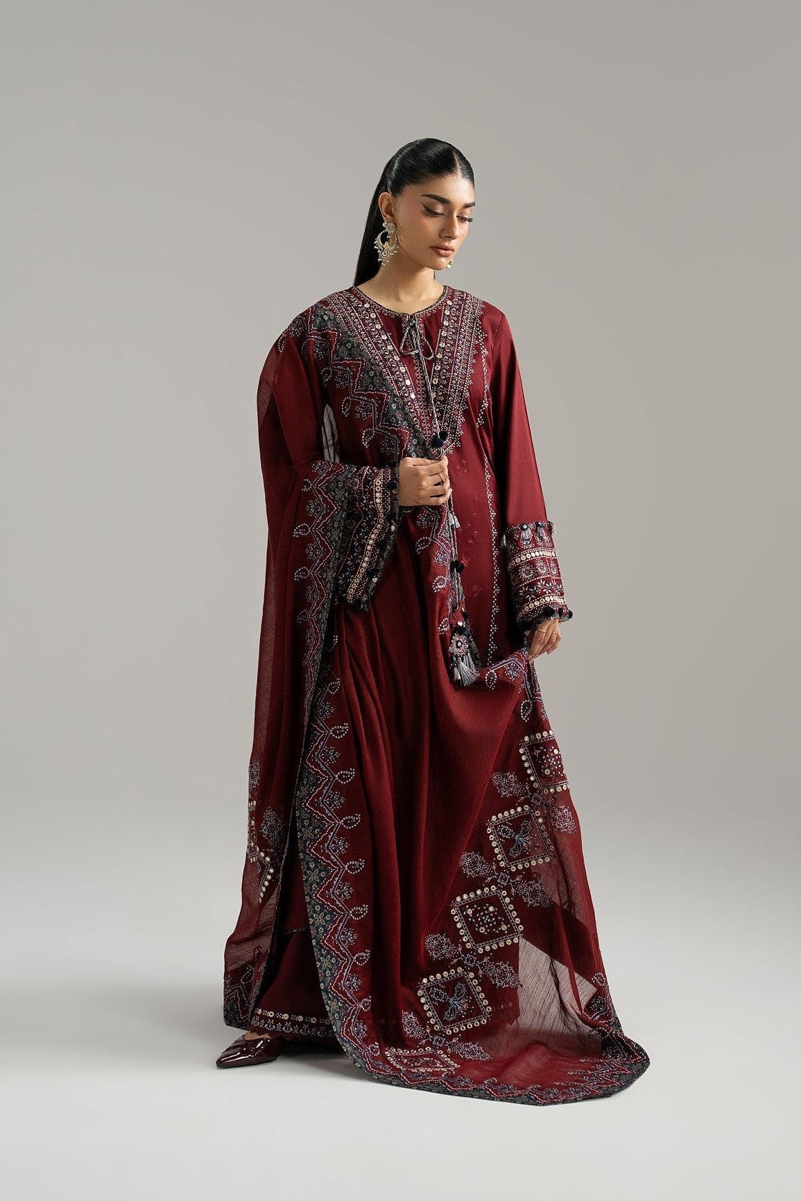 Mannam Saffron Set front view — Sindhi-inspired embroidery on sleeves and neckline | Pakistani Eid