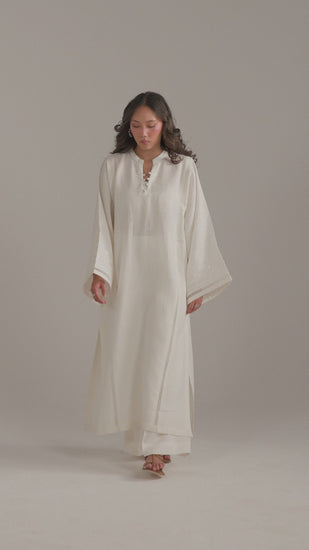 Video of model in the Noor Set, aari embroidery and lace insert detail in motion