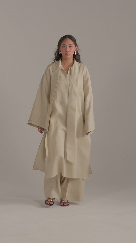 Video of model walking in the Sahara Set co-ord, scarf and bell sleeve movement