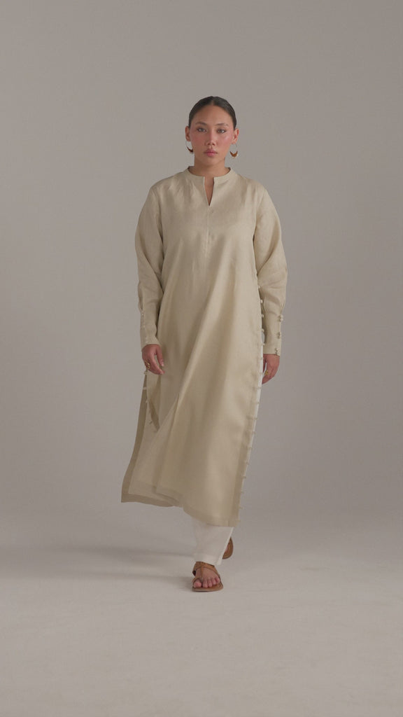Video of model walking in the Birch Set, beige kameez and contrast shalwar in motion