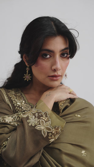 Elegant mehndi green Pakistani wedding function outfit with silk dupatta and hand-embroidered details