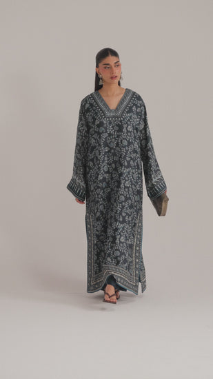 The Twilight Set is a navy blue pure silk Pakistani phiran with an ajrak-inspired print and dabka + sequin embroidery on the neckline, sleeves and hem