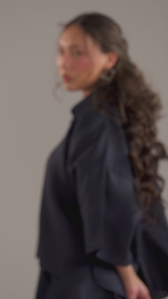 Video of model in the Indigo Set, cropped shirt and wide-leg trousers in motion