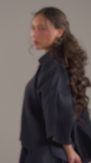 Video of model in the Indigo Set, cropped shirt and wide-leg trousers in motion