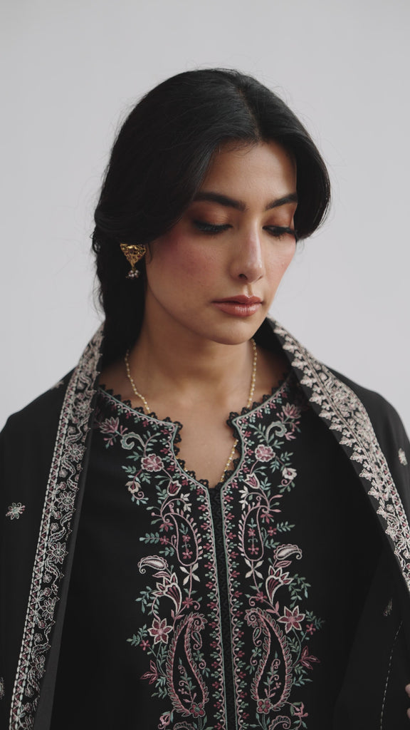 Video of Mannam Midnight Set — black khaddar Pakistani winter kameez with pastel embroidery and heavily embroidered shawl
