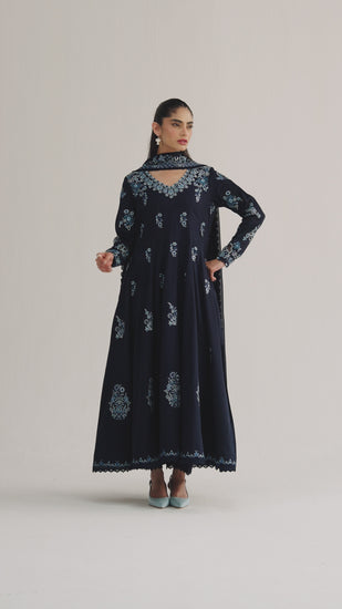 The Sapphire Set is a sapphire blue Pakistani Kalidaar kameez in Pima cotton with organza appliqué, multicolour loop accents, and lace-finished pencil trousers