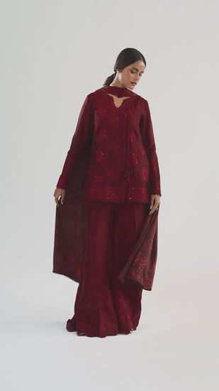 Video of Mannam Cherry Set — deep red raw silk short angrakha Pakistani Eid suit with flared trousers and printed silk dupatta
